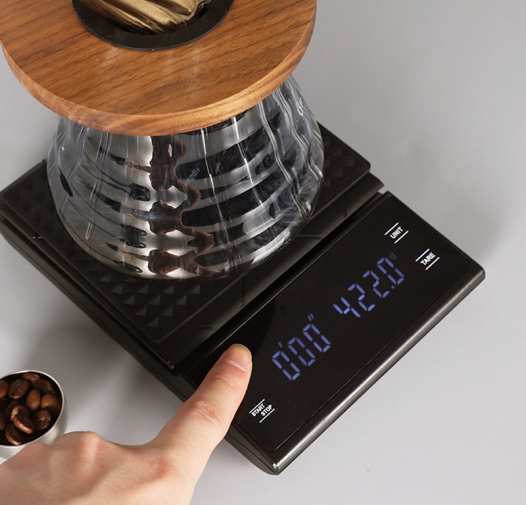 Close-up of the coffee scale timer display and touch controls