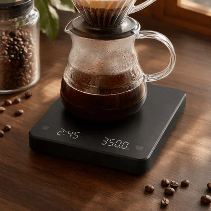 Digital coffee scale with timer under a pour-over brewer